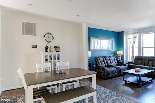 living room with dark wood-type flooring