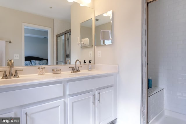 bathroom with vanity and walk in shower