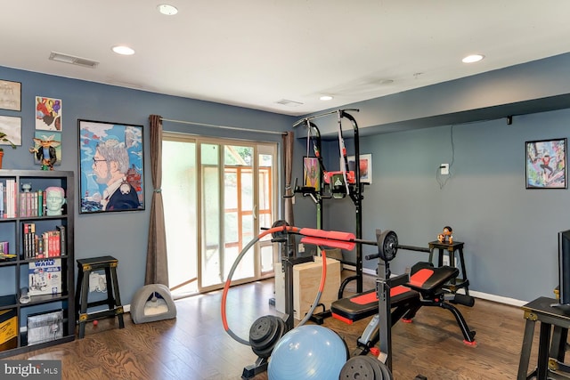 workout room featuring wood-type flooring