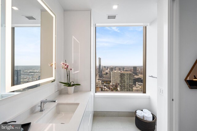 bathroom featuring vanity and tile patterned floors