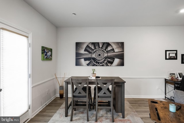 dining room with hardwood / wood-style flooring