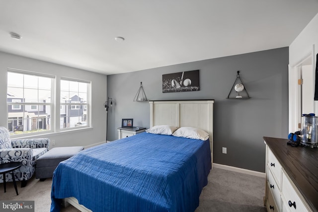 bedroom featuring light carpet