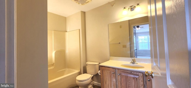 full bathroom with vanity, bathing tub / shower combination, and toilet