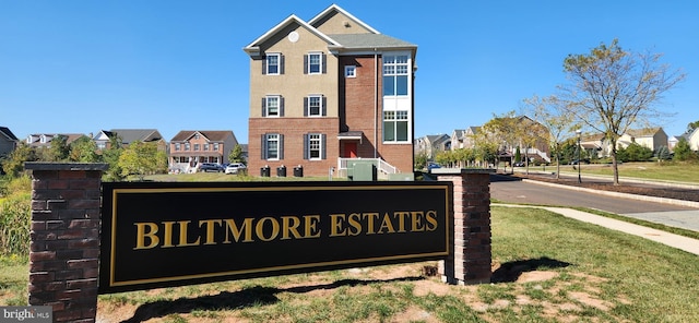 view of community sign