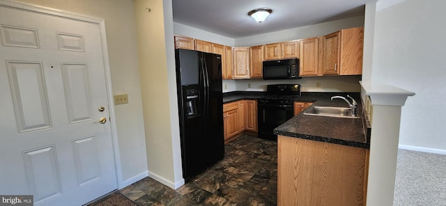 kitchen with sink and black appliances