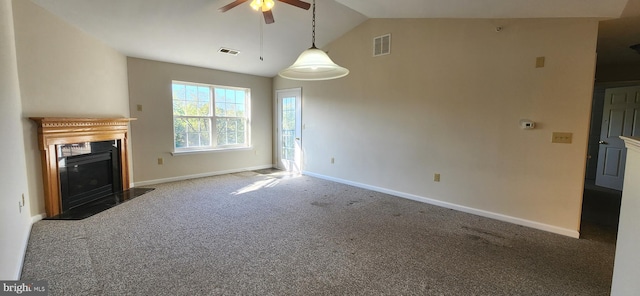 unfurnished living room featuring ceiling fan, lofted ceiling, and dark colored carpet