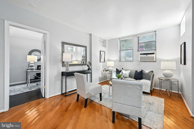 living room featuring hardwood / wood-style floors and cooling unit