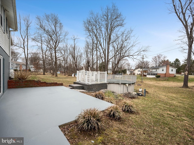 view of yard with a deck