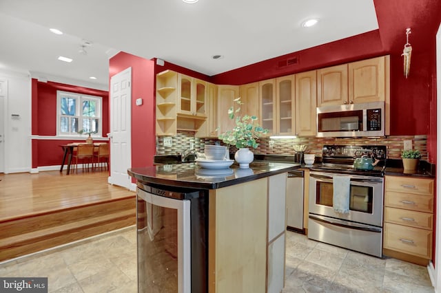 kitchen with a kitchen island, wine cooler, backsplash, stainless steel appliances, and light brown cabinets