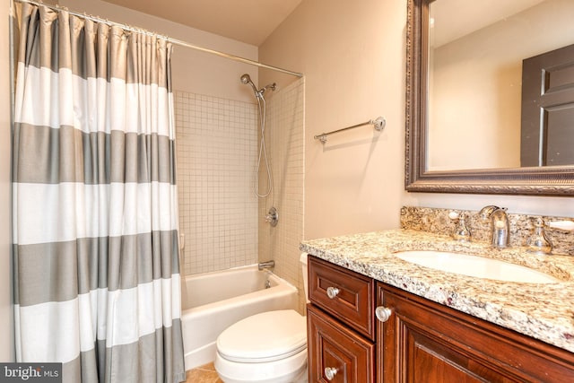 full bathroom featuring vanity, toilet, and shower / bath combination with curtain