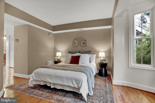 bedroom featuring hardwood / wood-style floors