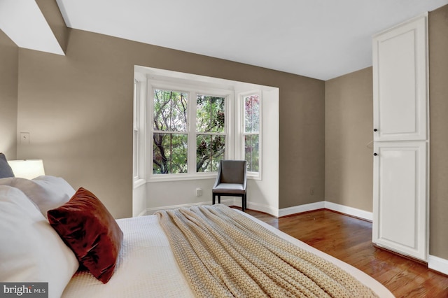 bedroom featuring hardwood / wood-style floors