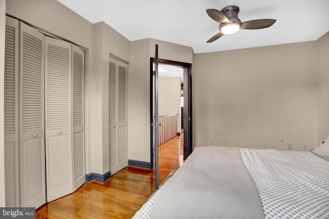 bedroom with hardwood / wood-style flooring and ceiling fan