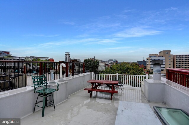 view of patio with a balcony