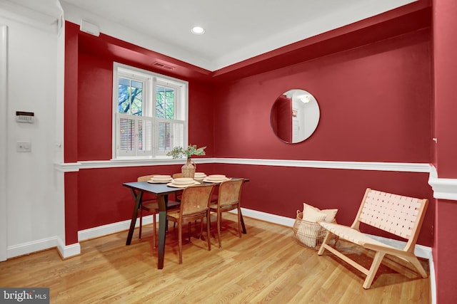 dining area featuring hardwood / wood-style flooring