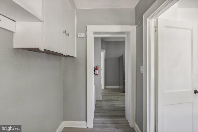 corridor featuring hardwood / wood-style flooring