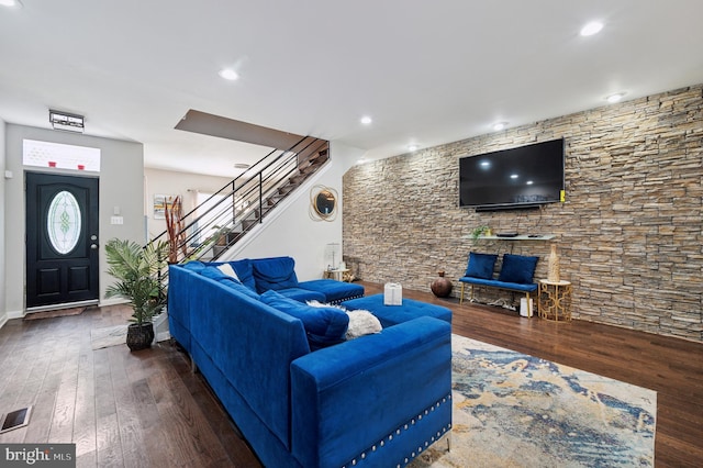 living room featuring dark hardwood / wood-style floors