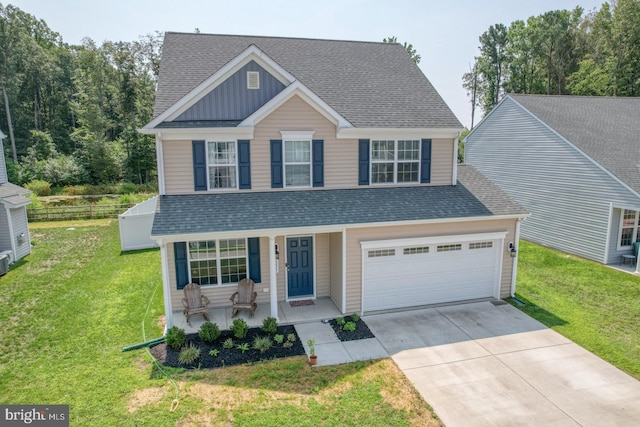 view of front facade featuring a garage and a front yard