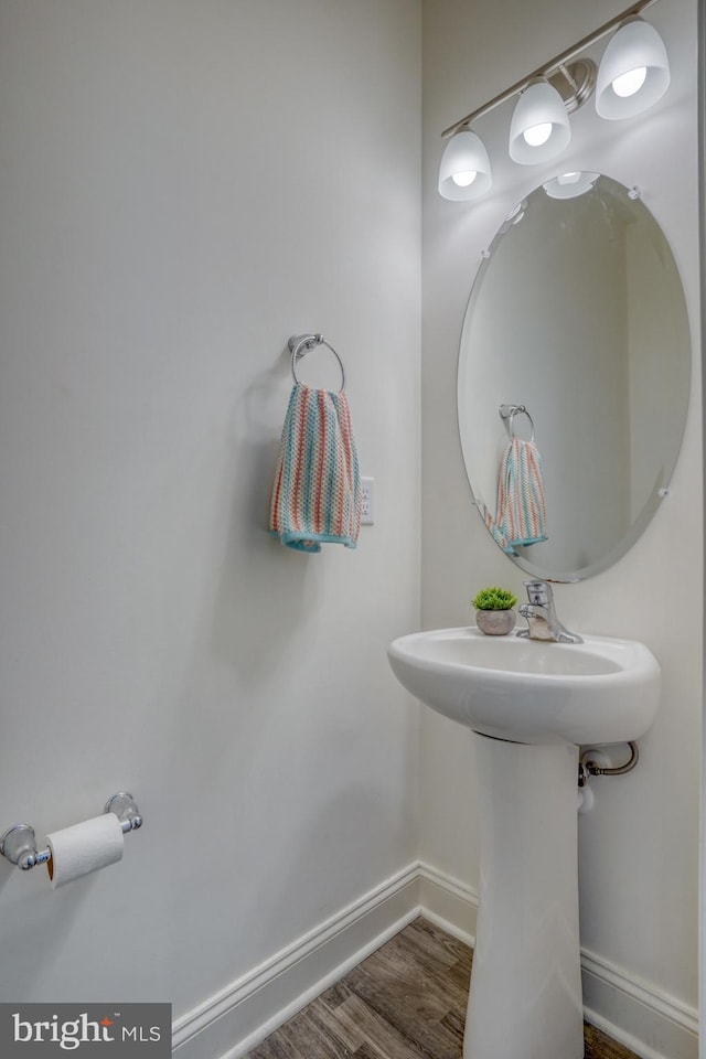 bathroom featuring hardwood / wood-style flooring