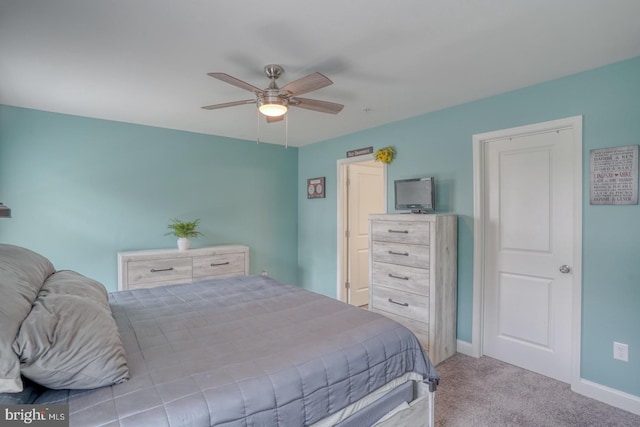 bedroom featuring ceiling fan and light colored carpet