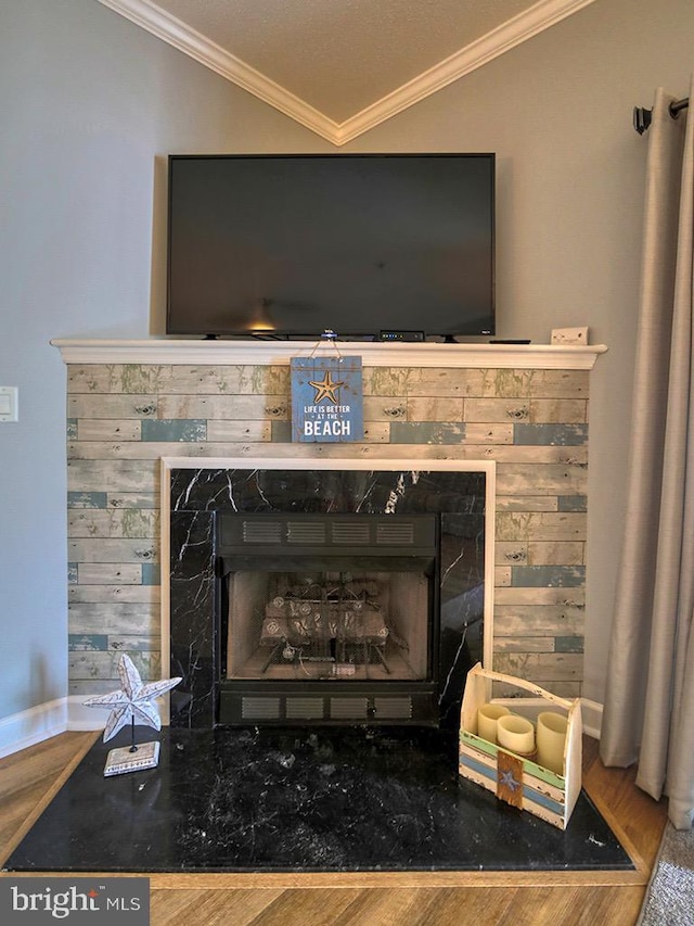 interior details featuring wood-type flooring and ornamental molding