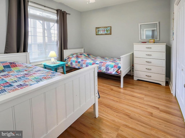 bedroom featuring light wood-type flooring