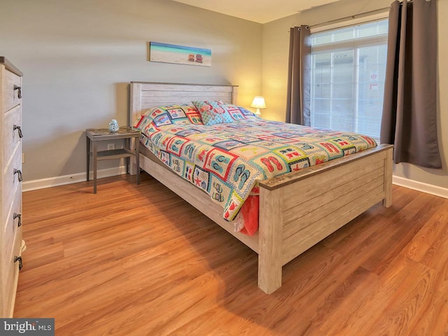 bedroom featuring light wood-type flooring