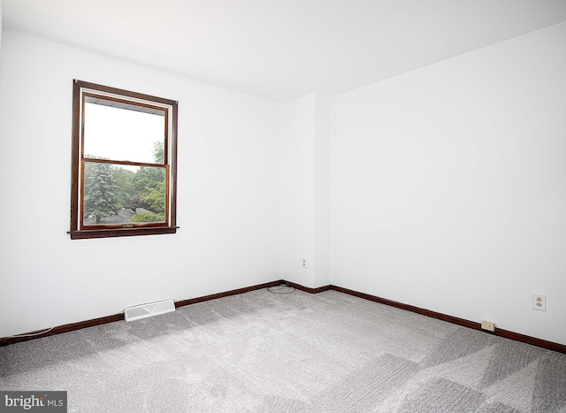 view of carpeted spare room