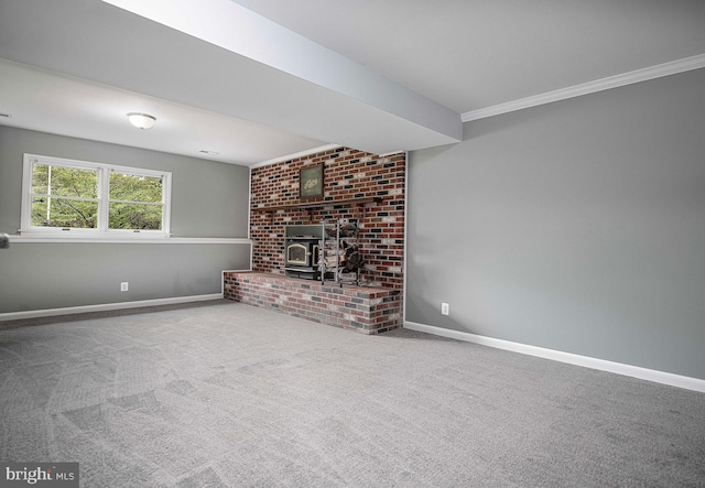 unfurnished living room with crown molding, carpet, and a wood stove