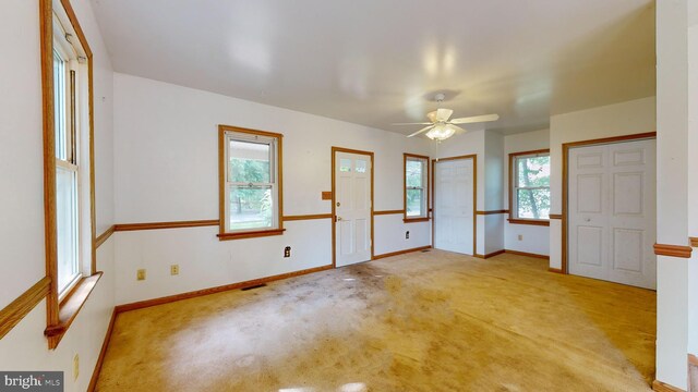 empty room with ceiling fan