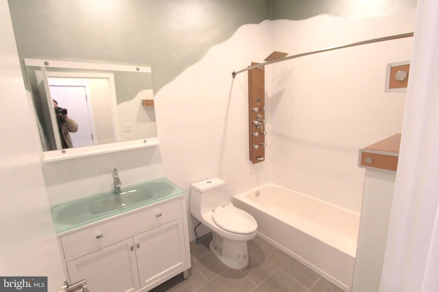 full bathroom with toilet, vanity, bathtub / shower combination, and tile patterned floors