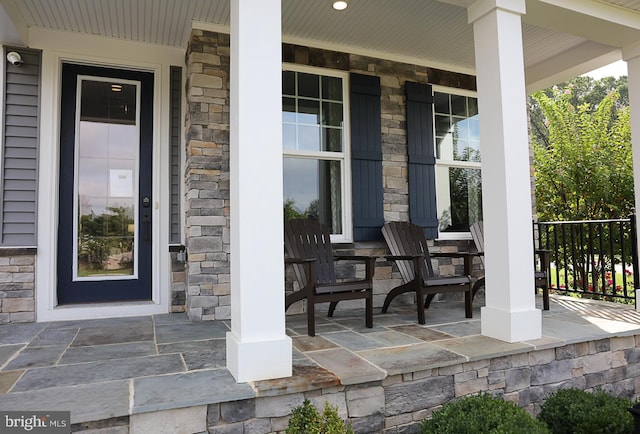 view of patio featuring a porch