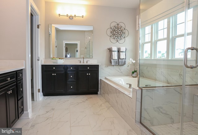 bathroom with vanity and plus walk in shower