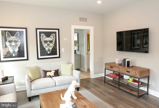 living room with dark wood-type flooring