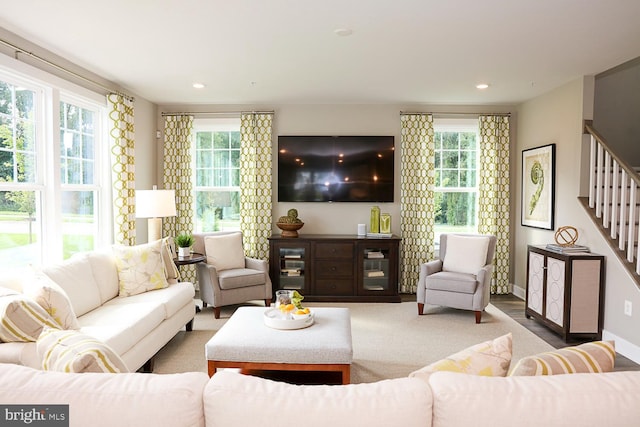 living room featuring a wealth of natural light