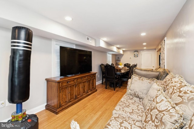 living room featuring light wood-type flooring