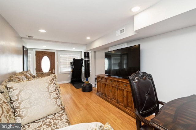 living room featuring light wood-type flooring