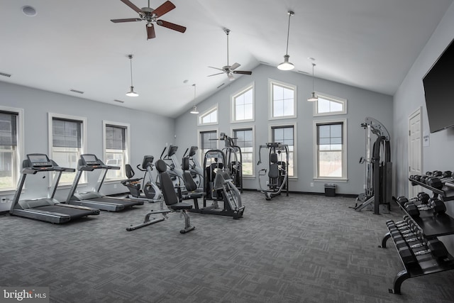 exercise room with high vaulted ceiling, dark colored carpet, and ceiling fan