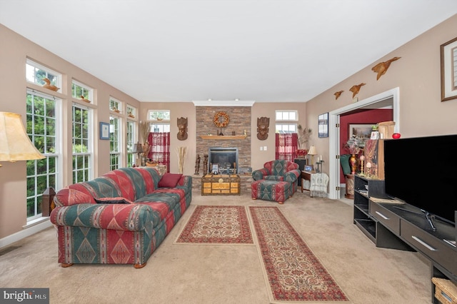 living room featuring a fireplace and light carpet