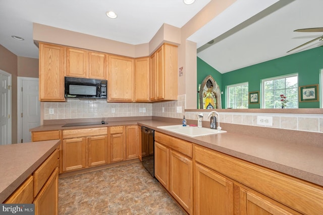 kitchen with black appliances, ceiling fan, tasteful backsplash, and sink