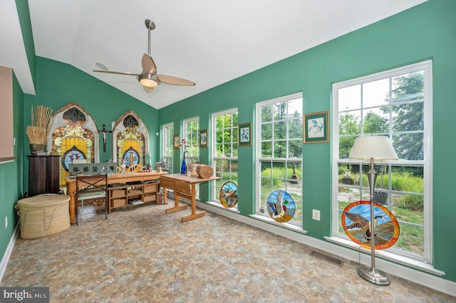 home office with vaulted ceiling and ceiling fan