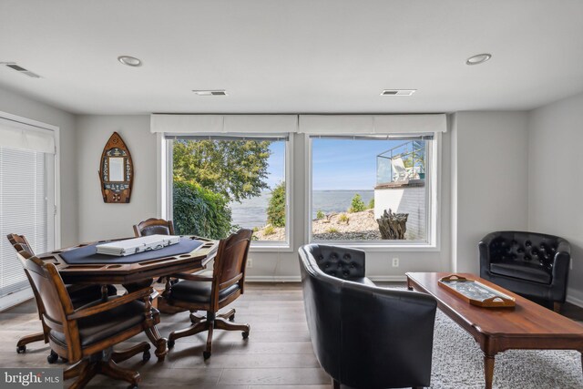 dining area featuring light wood-type flooring