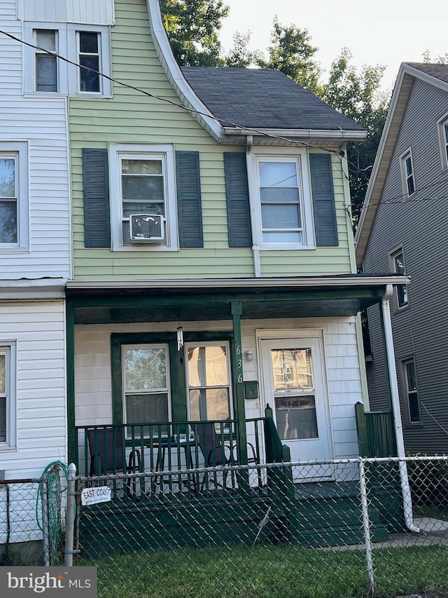 view of property with a porch