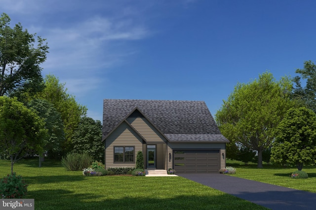 view of front of house featuring a front yard and a garage