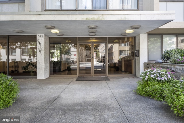 property entrance featuring french doors