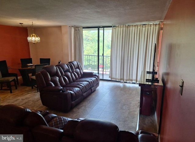 living room featuring a chandelier