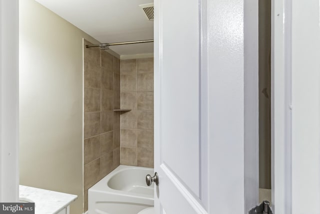 bathroom with toilet, shower / bathing tub combination, vanity, and visible vents