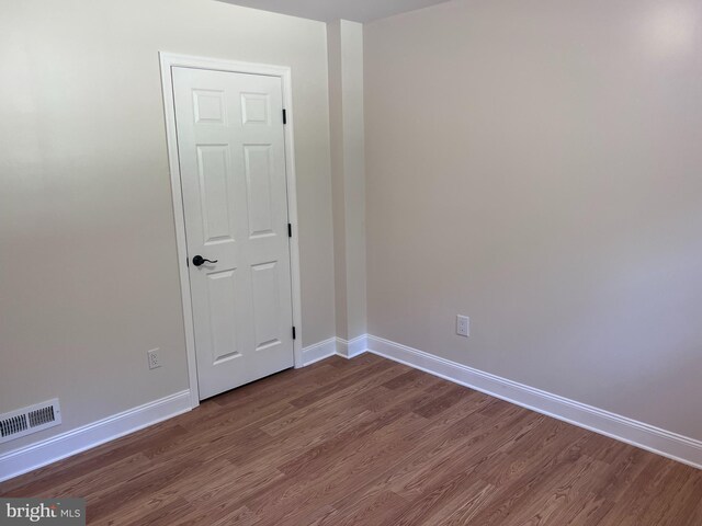 empty room featuring hardwood / wood-style floors