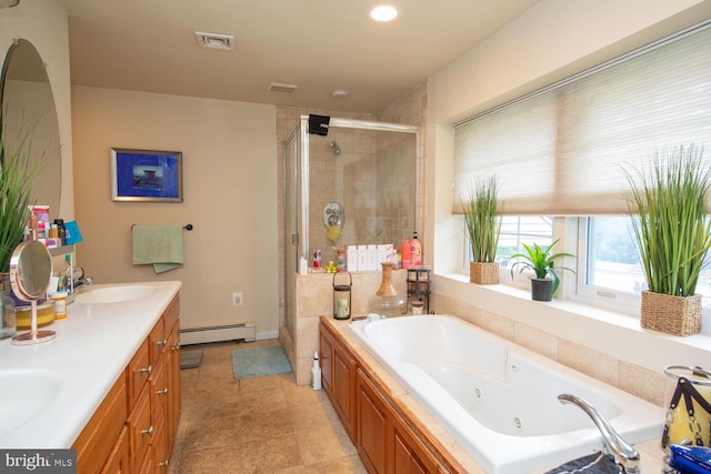 bathroom featuring shower with separate bathtub, dual vanity, tile patterned floors, and a baseboard heating unit