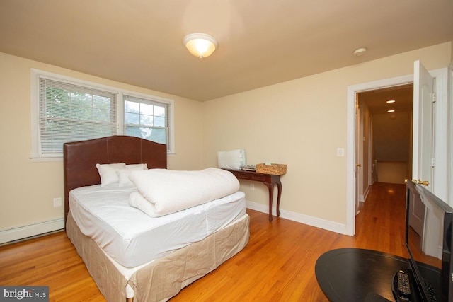 bedroom featuring light wood-type flooring